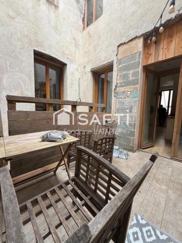 Maison de village avec 2 apts et un local commercial