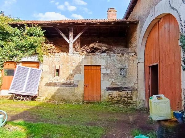 Grange avec dépendance et terrain