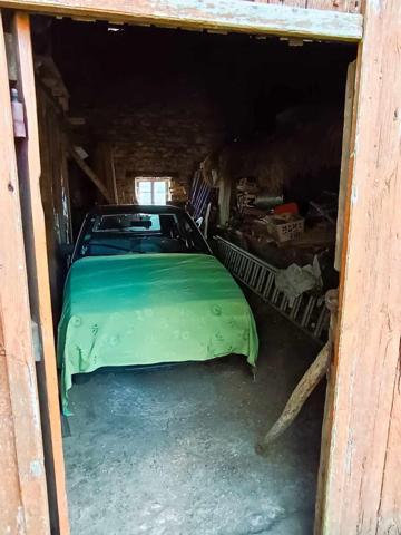 Grange avec dépendance et terrain