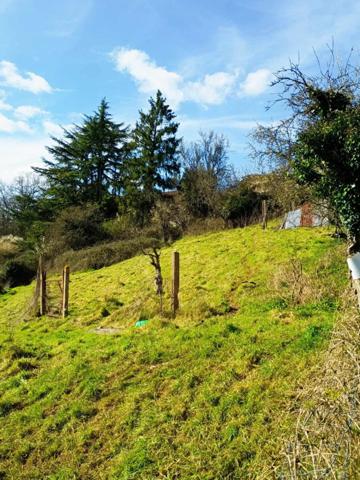 Grange avec dépendance et terrain