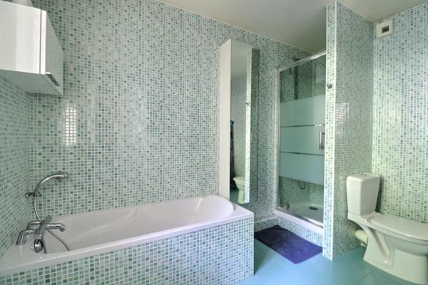 Appartement avec jardin 4 pièce(s) 132 m2 Carrez+ Véranda de 19m² + deux places de parking