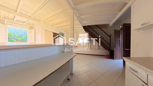 Maison T3, en bois, terrain plat, quartier calme.