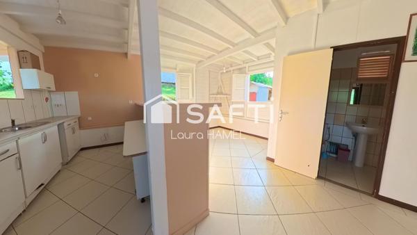 Maison T3, en bois, terrain plat, quartier calme.