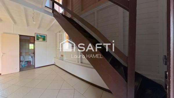 Maison T3, en bois, terrain plat, quartier calme.