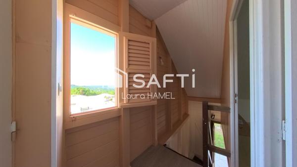 Maison T3, en bois, terrain plat, quartier calme.