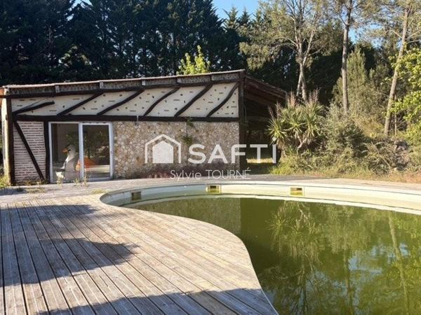MAISON EN PIERRE ET PISCINE SUR TERRAIN DE 9173 m2
