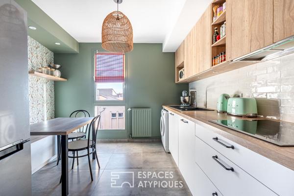 Appartement rénové avec terrasse et garage