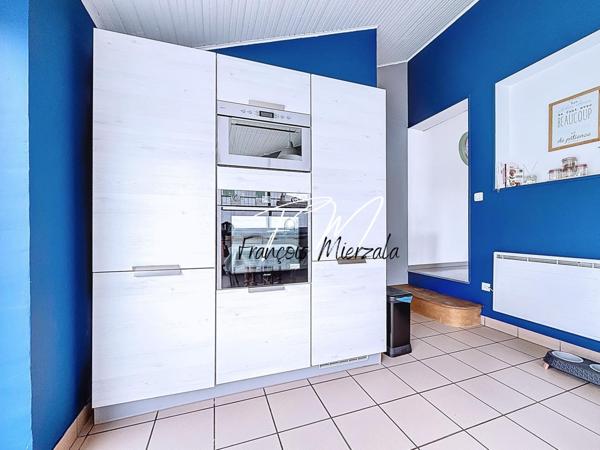 Semi plain-pied 4 chambres + hangar