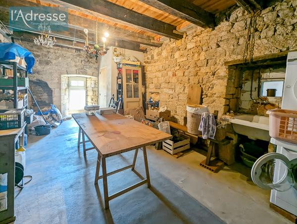 Maison de caractère du XVe siècle avec vue sur le Lot et le coeur historique de Puy L'Evêque