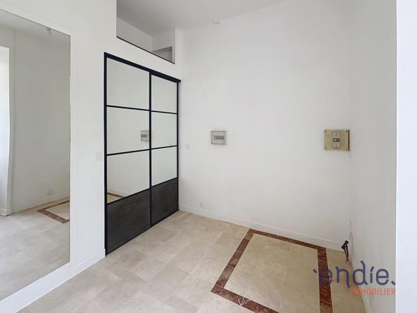 Appartement atypique 4 pièces avec jardin et parking dans un cadre exceptionnel