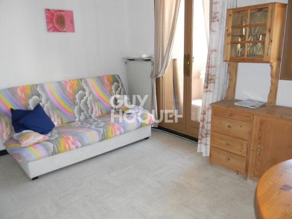 Appartement avec locataire en place + parking