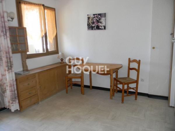 Appartement avec locataire en place + parking
