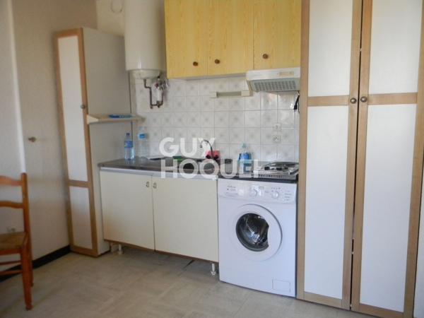 Appartement avec locataire en place + parking