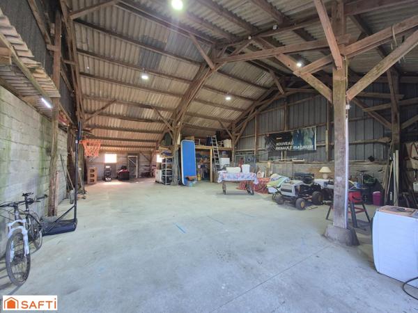 Maison avec hangar et terrain constructible