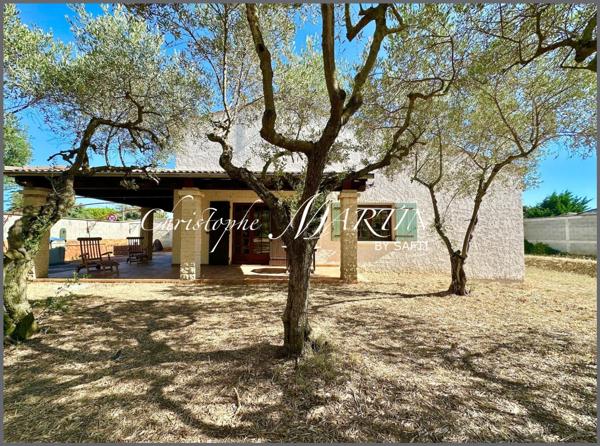 Maison familiale avec garage et grand terrain clôturé