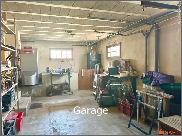 Maison familiale avec garage et grand terrain clôturé