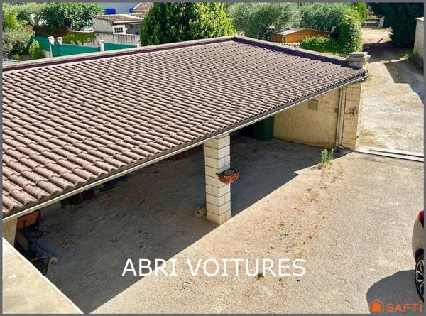 Maison familiale avec garage et grand terrain clôturé