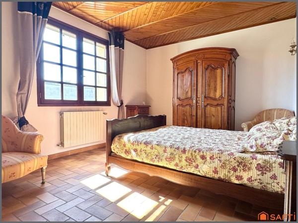 Maison familiale avec garage et grand terrain clôturé