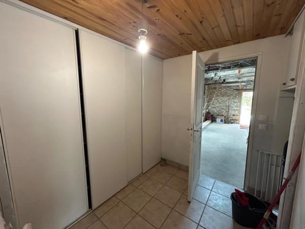 CHARMANTE LONGERE 200 m² BOURG DE GRAND-CHAMP (56)