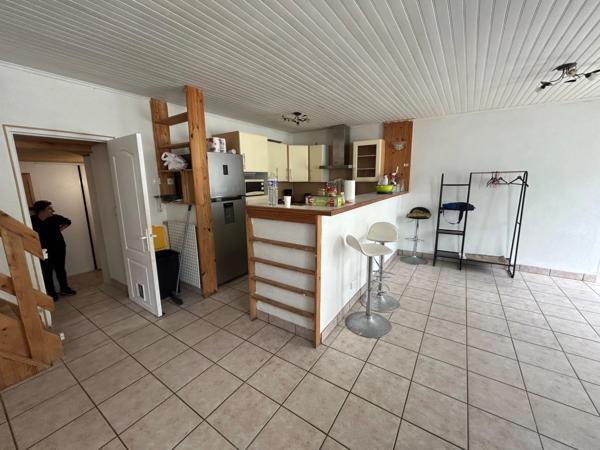 CHARMANTE LONGERE 200 m² BOURG DE GRAND-CHAMP (56)