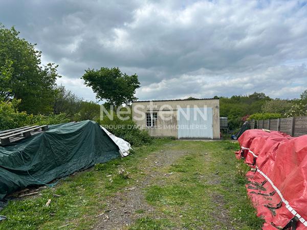 Terrain constructible avec un garage à Questembert