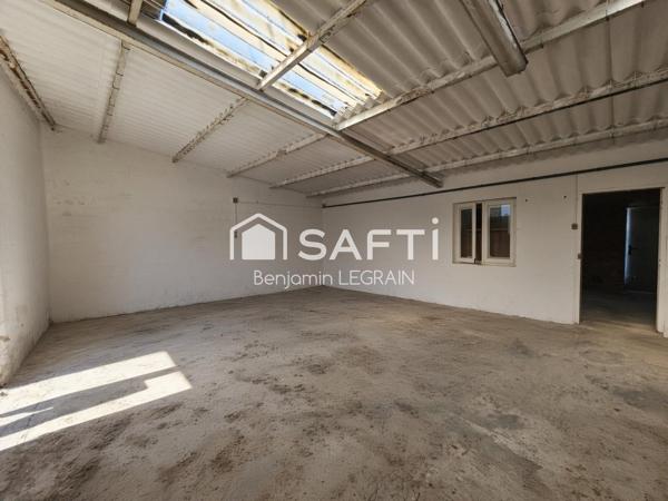 Garage de 90m2 sur terrain constructible