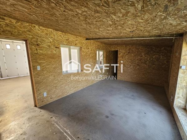 Garage de 90m2 sur terrain constructible