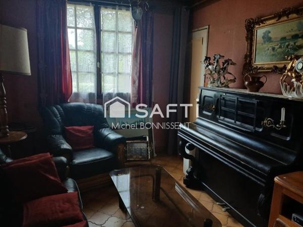 Pavillon 101 m2 , 4 chambres , un garage , terrain 1300m