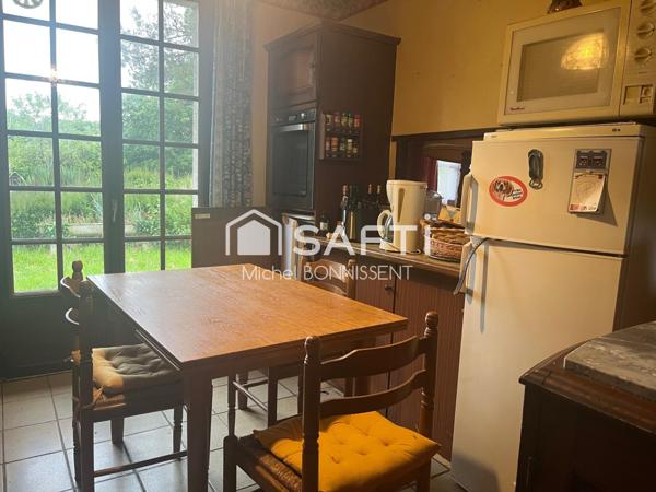 Pavillon 101 m2 , 4 chambres , un garage , terrain 1300m