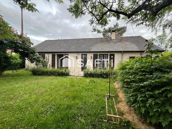 Pavillon 101 m2 , 4 chambres , un garage , terrain 1300m