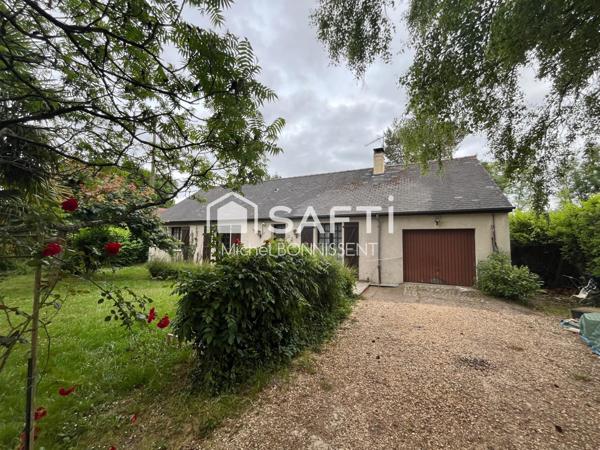 Pavillon 101 m2 , 4 chambres , un garage , terrain 1300m