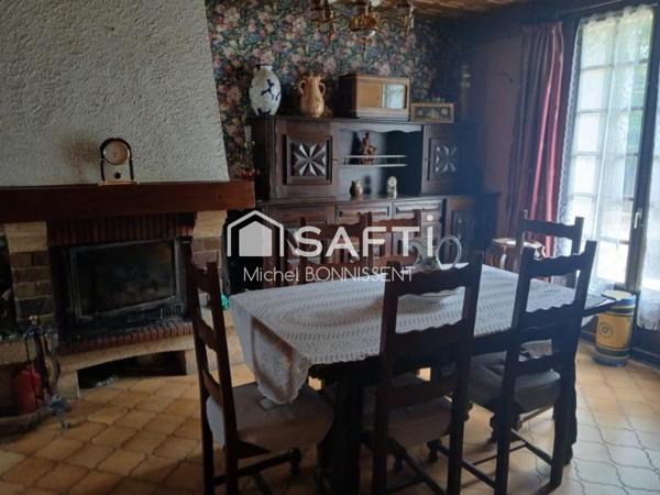 Pavillon 101 m2 , 4 chambres , un garage , terrain 1300m