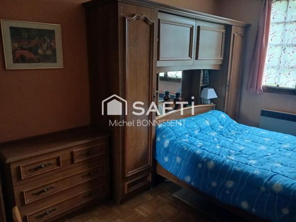 Pavillon 101 m2 , 4 chambres , un garage , terrain 1300m