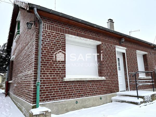 Maison avec petites dépendances et garage