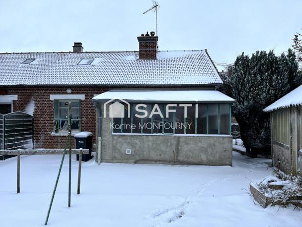 Maison avec petites dépendances et garage