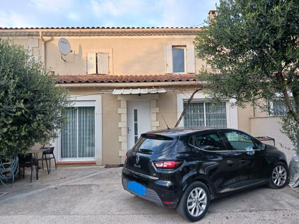 Maison 87 m² avec cour et garage