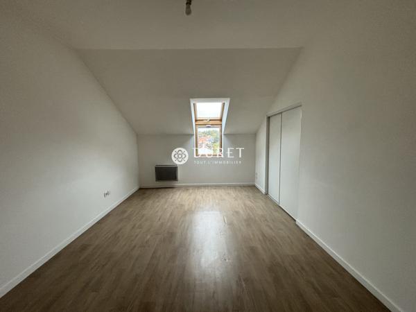 T3 RECENT AU DERNIER ETAGE AVEC BALCON ET 2 PLACES DE STATIONNEMENTS
