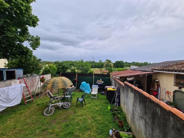 Maison de 80m2, grande pièce de vie, petit jardin, 2 chambres