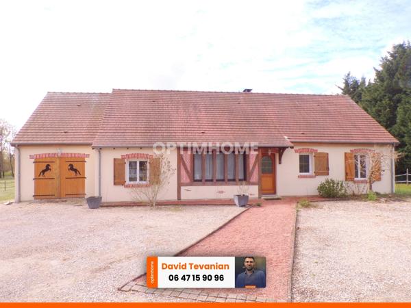 Maison de plain-pied avec garage d'une surface de 117 m², 2 chambres et une buanderie, excellent DPE C dans un environnement très calme sur la commune de Villefranche sur Cher