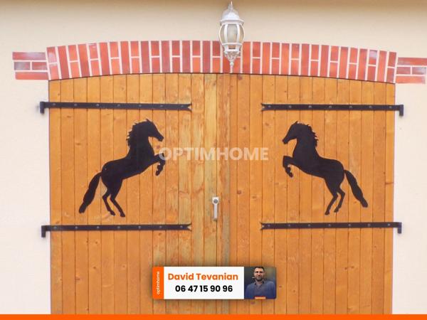 Maison de plain-pied avec garage d'une surface de 117 m², 2 chambres et une buanderie, excellent DPE C dans un environnement très calme sur la commune de Villefranche sur Cher