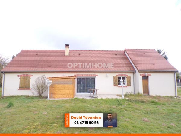 Maison de plain-pied avec garage d'une surface de 117 m², 2 chambres et une buanderie, excellent DPE C dans un environnement très calme sur la commune de Villefranche sur Cher