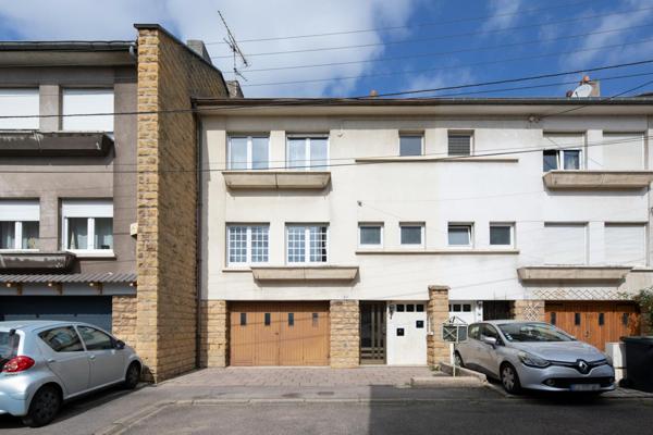 Maison de 90m² avec 3 chambres, garage, et jardin