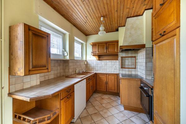 Maison de 90m² avec 3 chambres, garage, et jardin