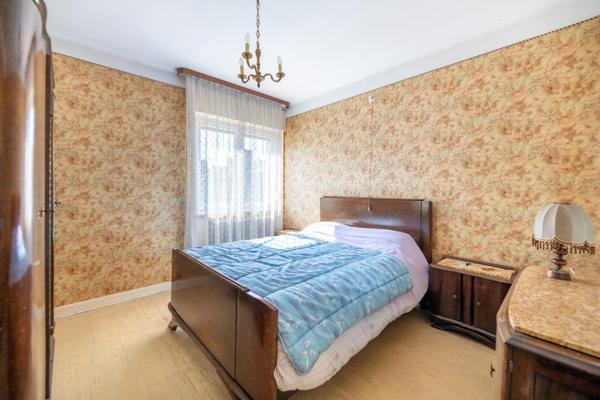 Maison de 90m² avec 3 chambres, garage, et jardin