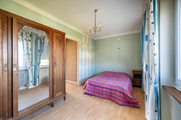 Maison de 90m² avec 3 chambres, garage, et jardin