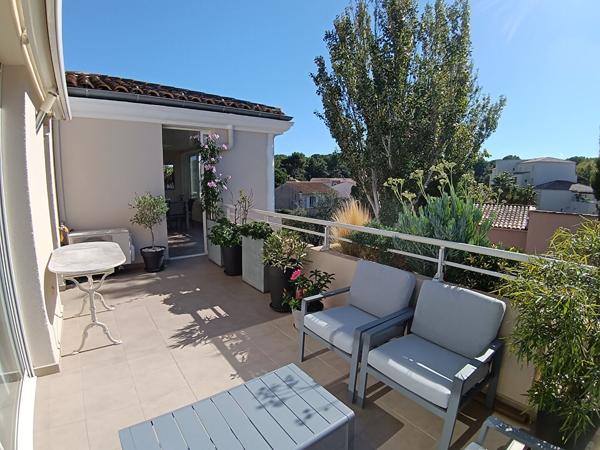 Appartement T4 de 78,81m² avec terrasse, loggia, garage et PK