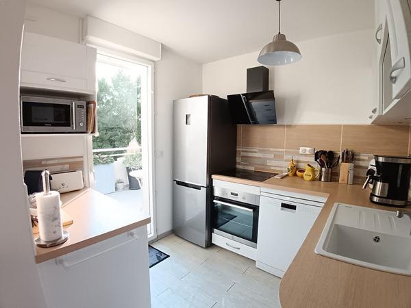 Appartement T4 de 78,81m² avec terrasse, loggia, garage et PK