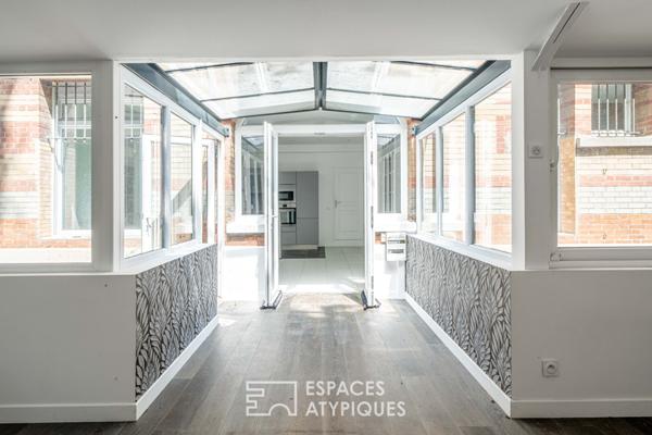 Rez-de jardin avec terrasses et véranda, rue de la Colonie