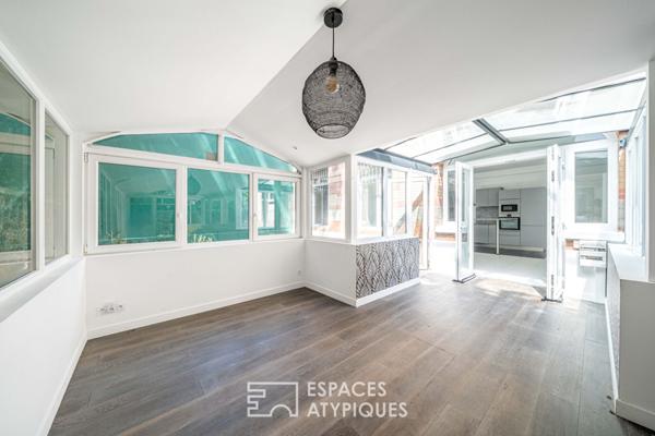 Rez-de jardin avec terrasses et véranda, rue de la Colonie