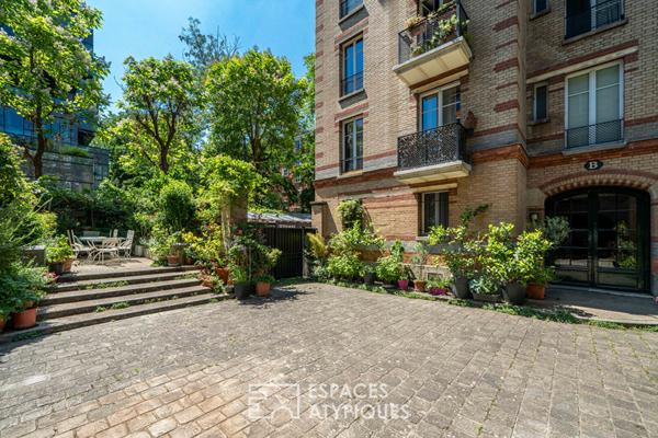Rez-de jardin avec terrasses et véranda, rue de la Colonie